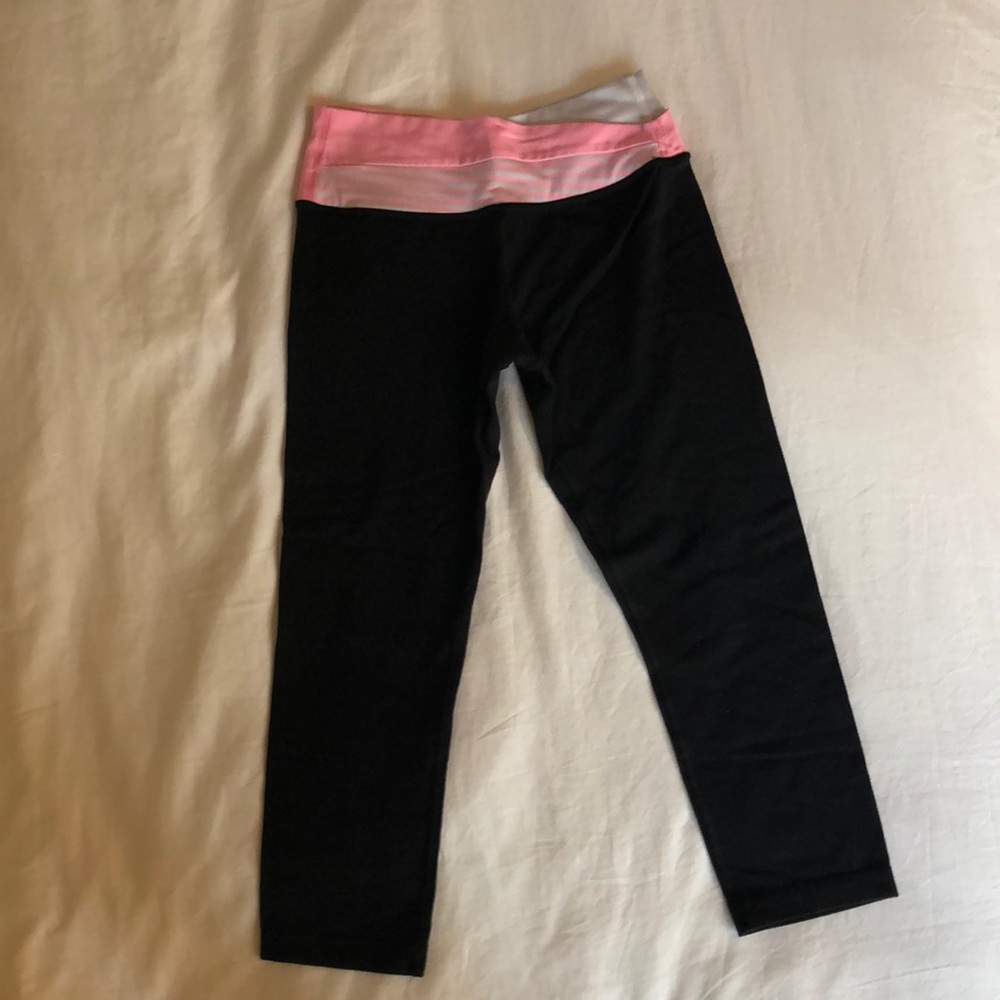 Lululemon Size 4 black crop w/ pink & white waist